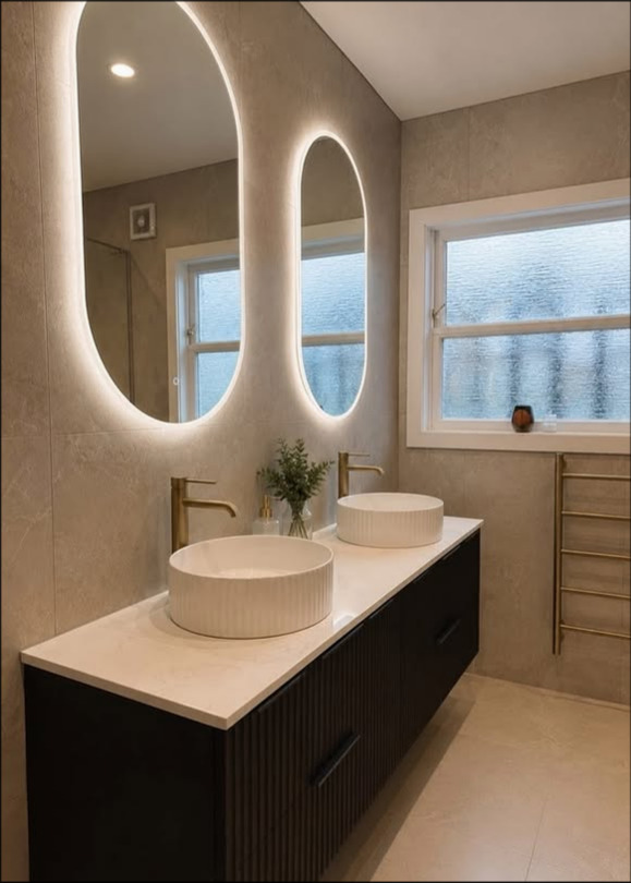 Luxury fluted double vanity renovation with LED mirrors installed by Mike Whitehead